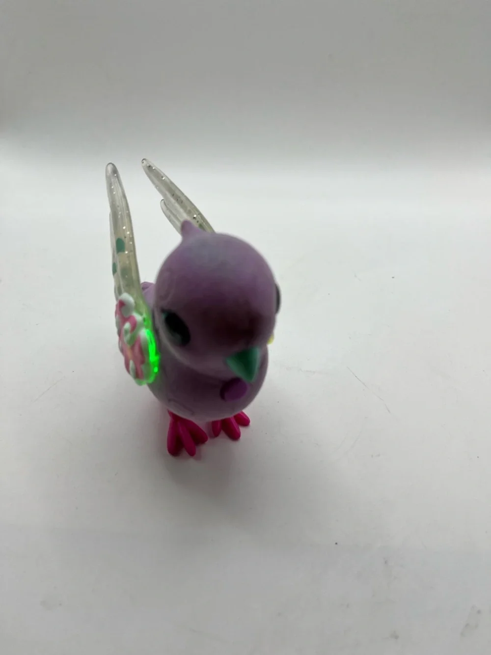 Polly Pearl Purple Decorative Pet Bird Toy with Pink Accents Lights Up and Chirp